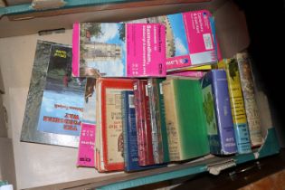 A box containing travel books and ordnance survey