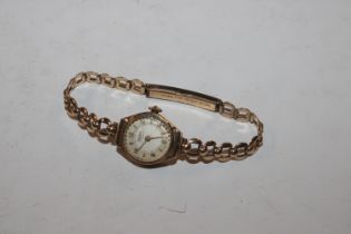 A Rotary 9ct gold cased lady's wrist watch with 9ct strap and clasp, approx. total weight 14gms