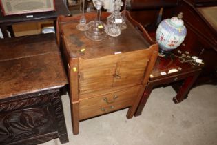 A Georgian mahogany and chequer band inlaid commode