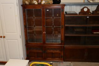 An Old Charm oak and leaded glazed cabinet with cu