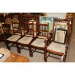 A set of eight oak dining chairs comprising of two