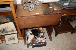 An oak drop leaf side table