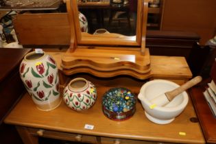 A Nicholas Mosse pottery vase and smaller vase, a tin of marbles and a pestle and mortor