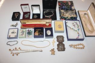 A box of various costume jewellery to include neck