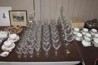 A collection of cut glassware including two decant