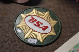 A circular painted cast iron sign for "BSA" (195)