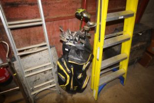 A Powerkaddy Dri Edition golf bag and contents of