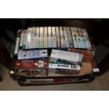 Two boxes of VHS tapes