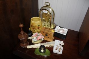 A box of miscellaneous items including hand turned letter opener and carriage clock