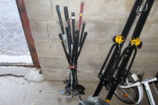 A quantity of various golf clubs to include driver