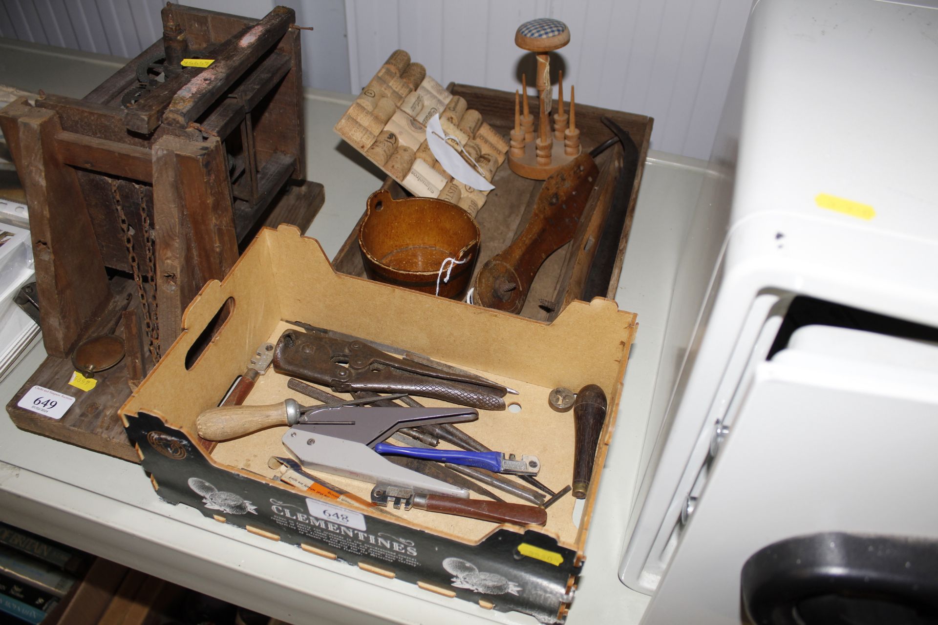 Two boxes containing vintage ice skates, cotton re