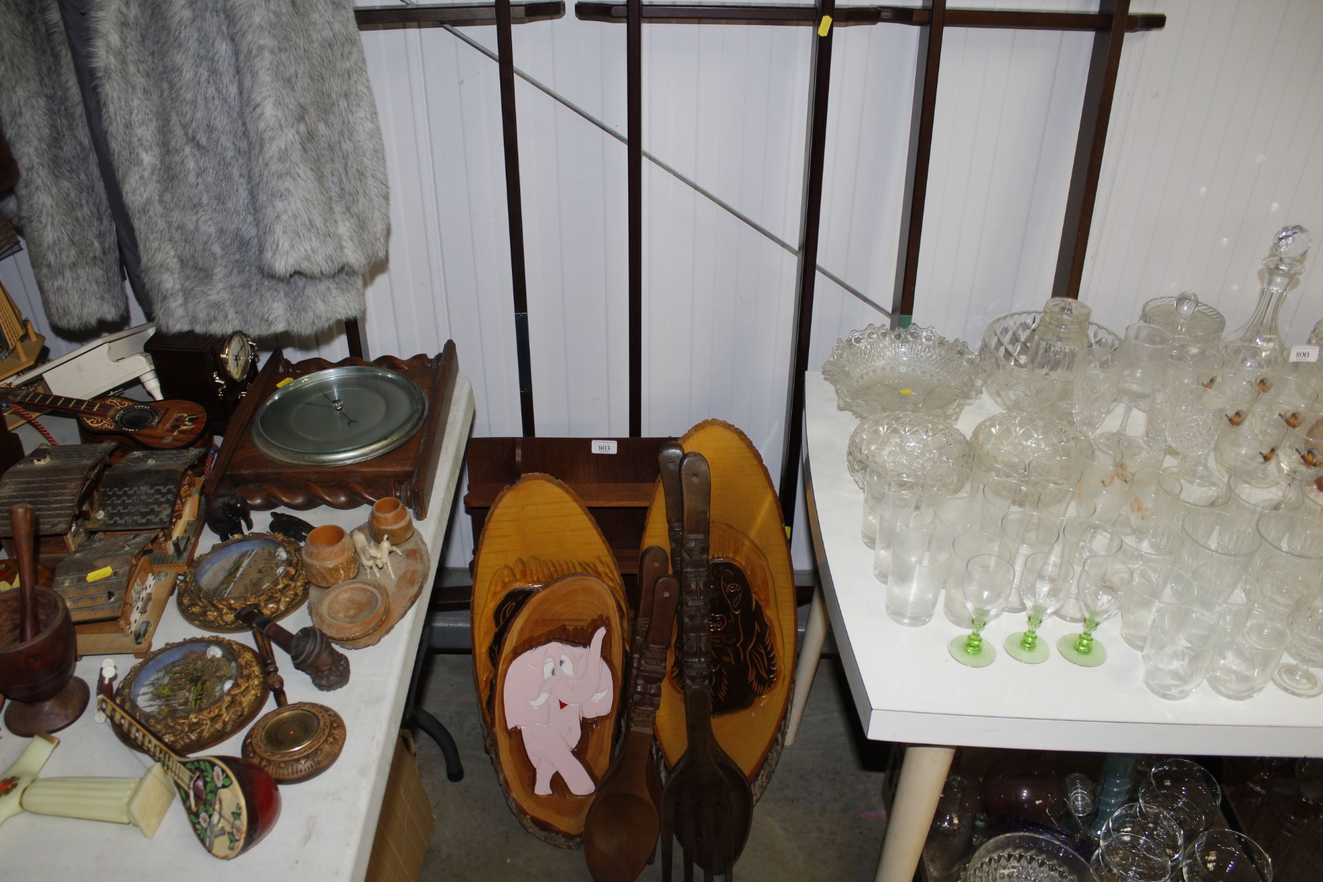 A collection of wooden plaques and plate racks