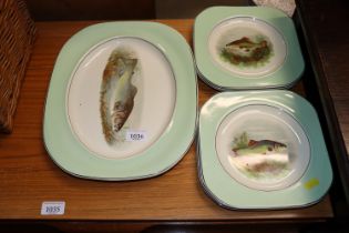 A quaintly for woods ware fish plates