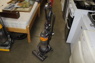 A Dyson DC25 upright vacuum cleaner