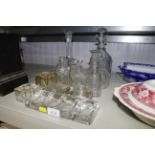 A collection of glassware including decanters and