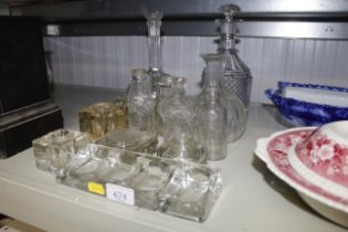 A collection of glassware including decanters and