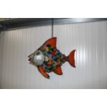 A recycled tin model of a fish
