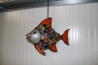 A recycled tin model of a fish