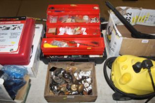 A plastic tool box and contents of various fixings