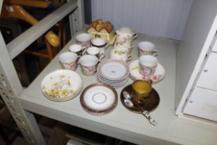 A collection of various patterned tea and coffee w