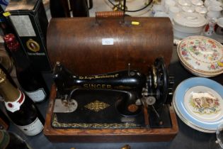 Singer hand sewing machine in fitted case