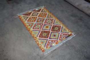 An approx. 4'5" x 2'10" Chobi Kelim rug