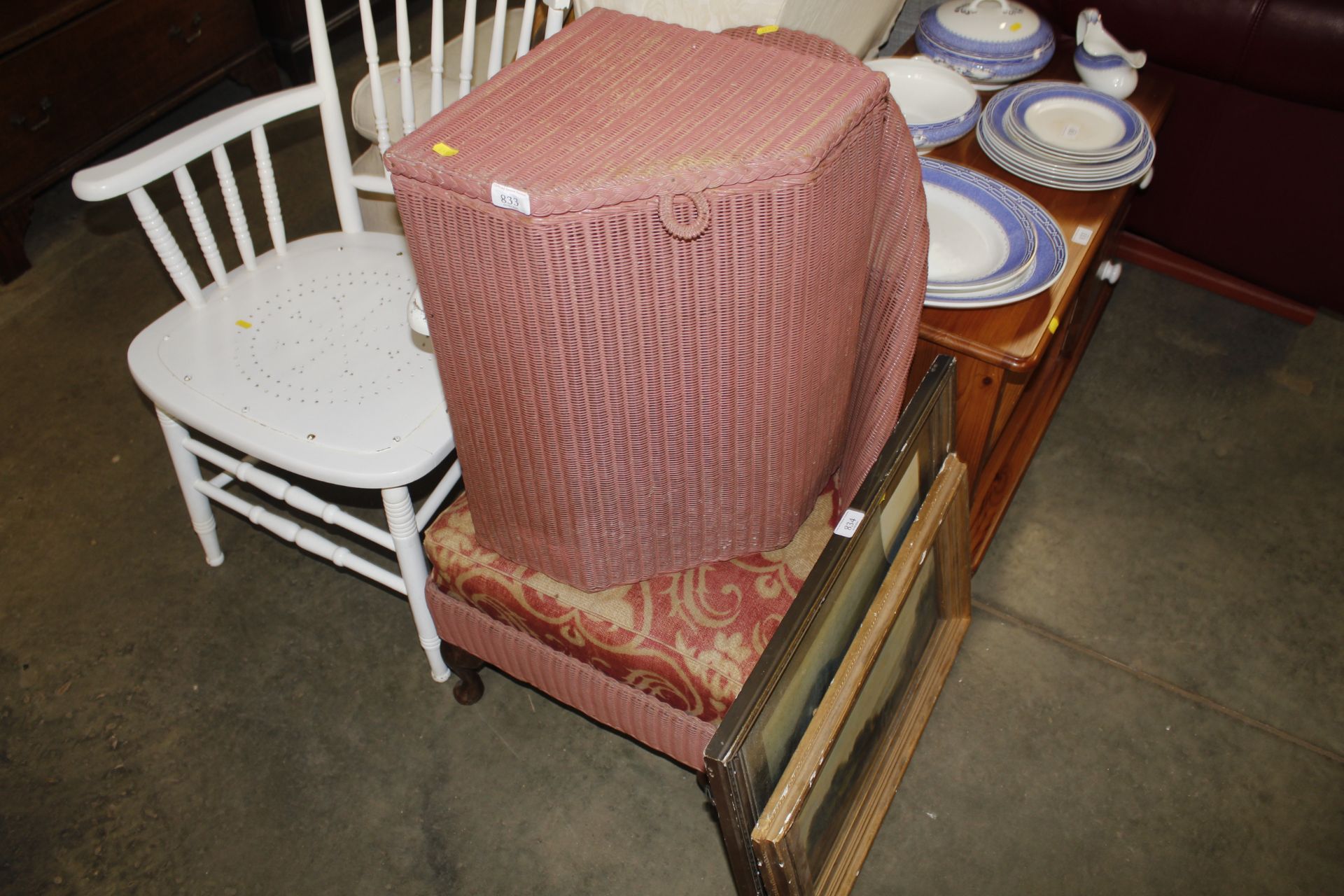 A Lloyd Loom linen basket and chair