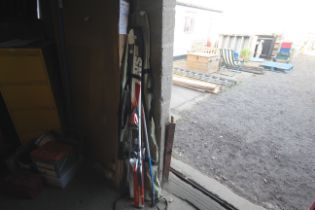 A pair of Quechua RNS500 skis with ski poles and c
