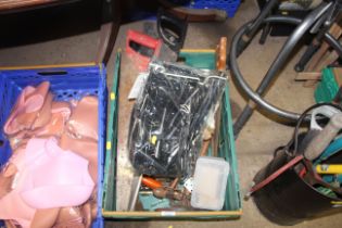 A plastic crate containing a quantity of tools to