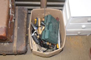 A box containing tools to include mallets, plaster