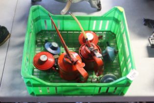 A quantity of gas regulators and two oil cans