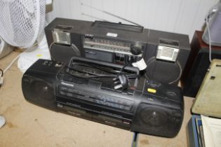 A Phillips radio cassette player and a Panasonic r