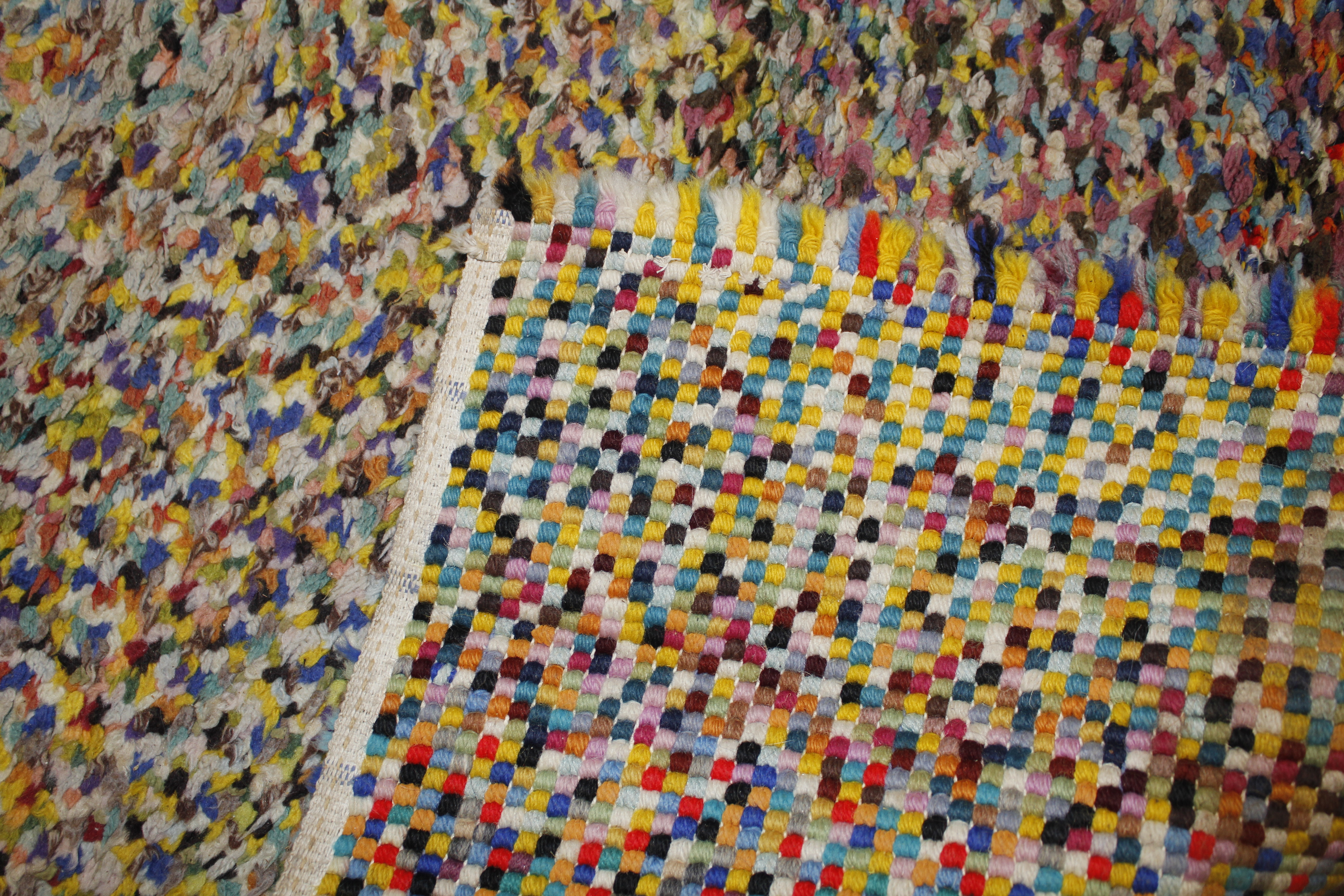 An approx. 6'7" x 3'4" multi coloured wool rug - Image 3 of 3