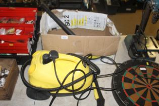 A Karcher SC2 steam cleaner with original box and