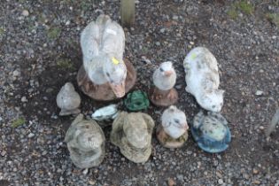 A quantity of various garden animal ornaments in t