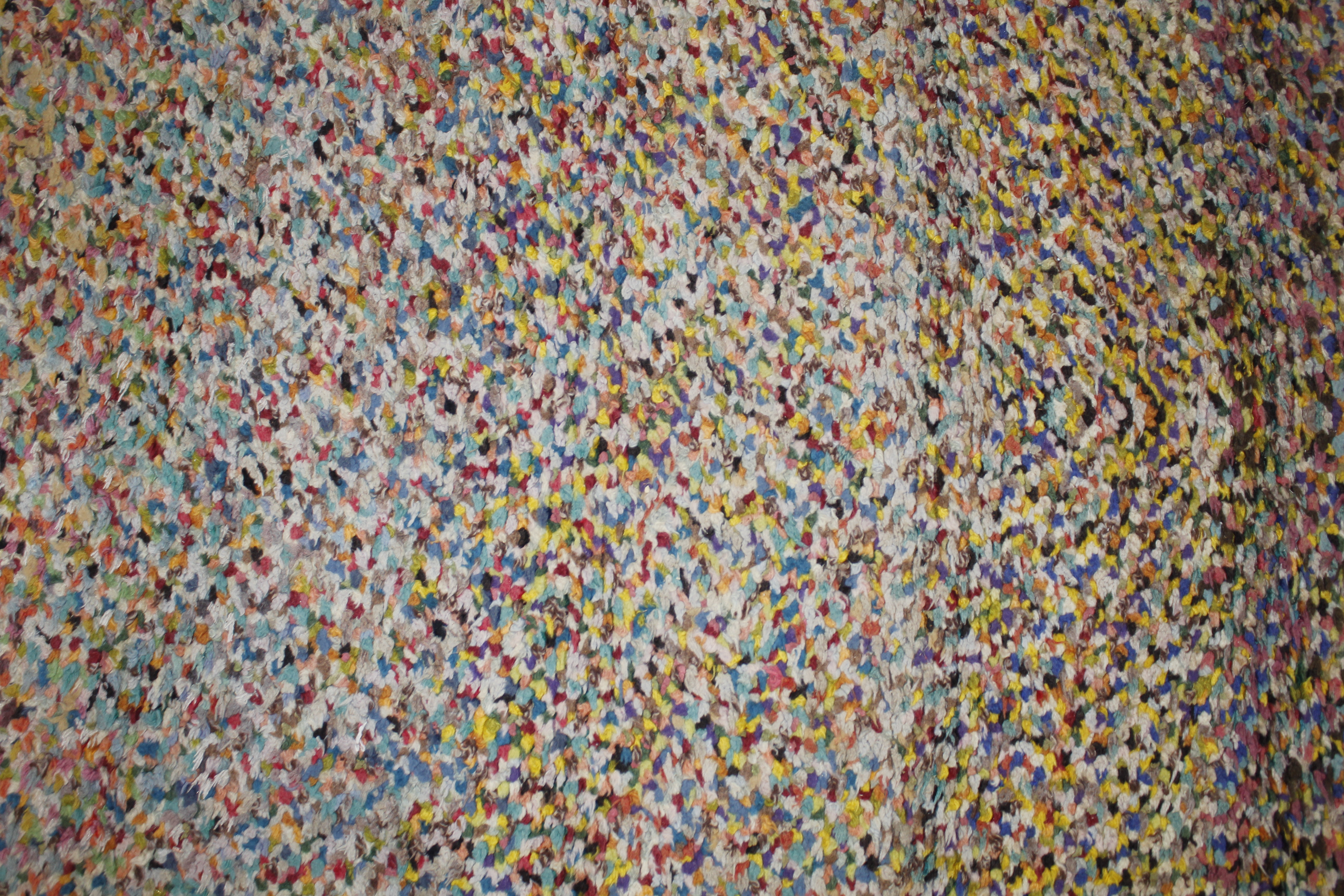 An approx. 6'7" x 3'4" multi coloured wool rug - Image 2 of 3