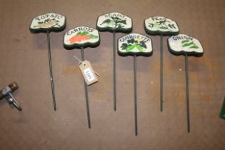 Six painted cast iron vegetable markers (178)