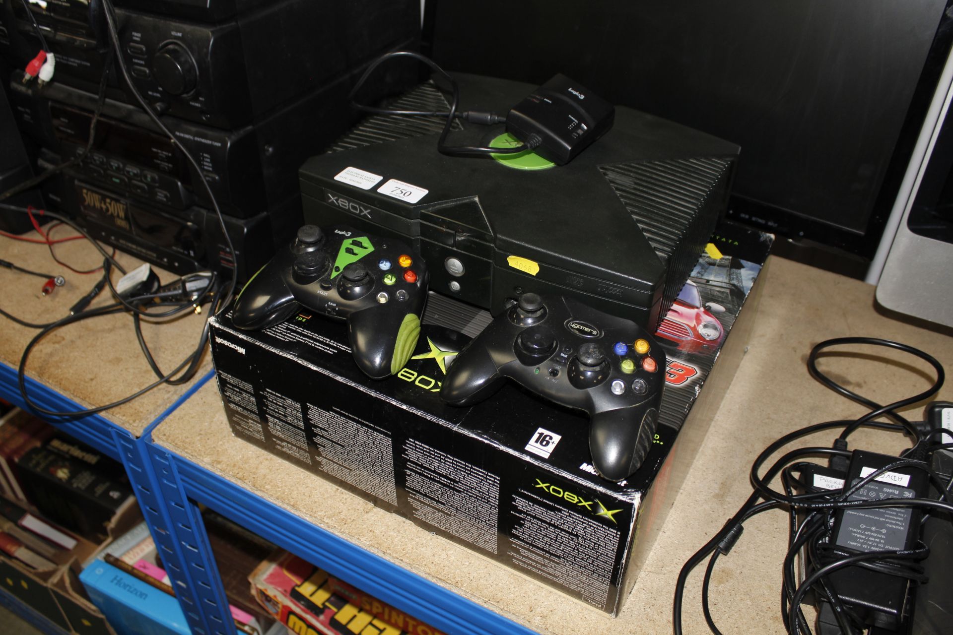 An X-Box games console, two controllers