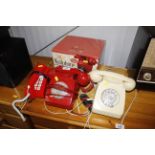 Two rotary dial telephones, retro style phone and