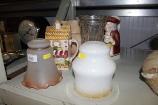 A novelty tea pot, character jug, two light shades
