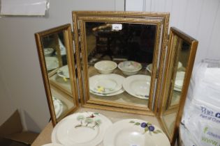 A gilt triptych mirror