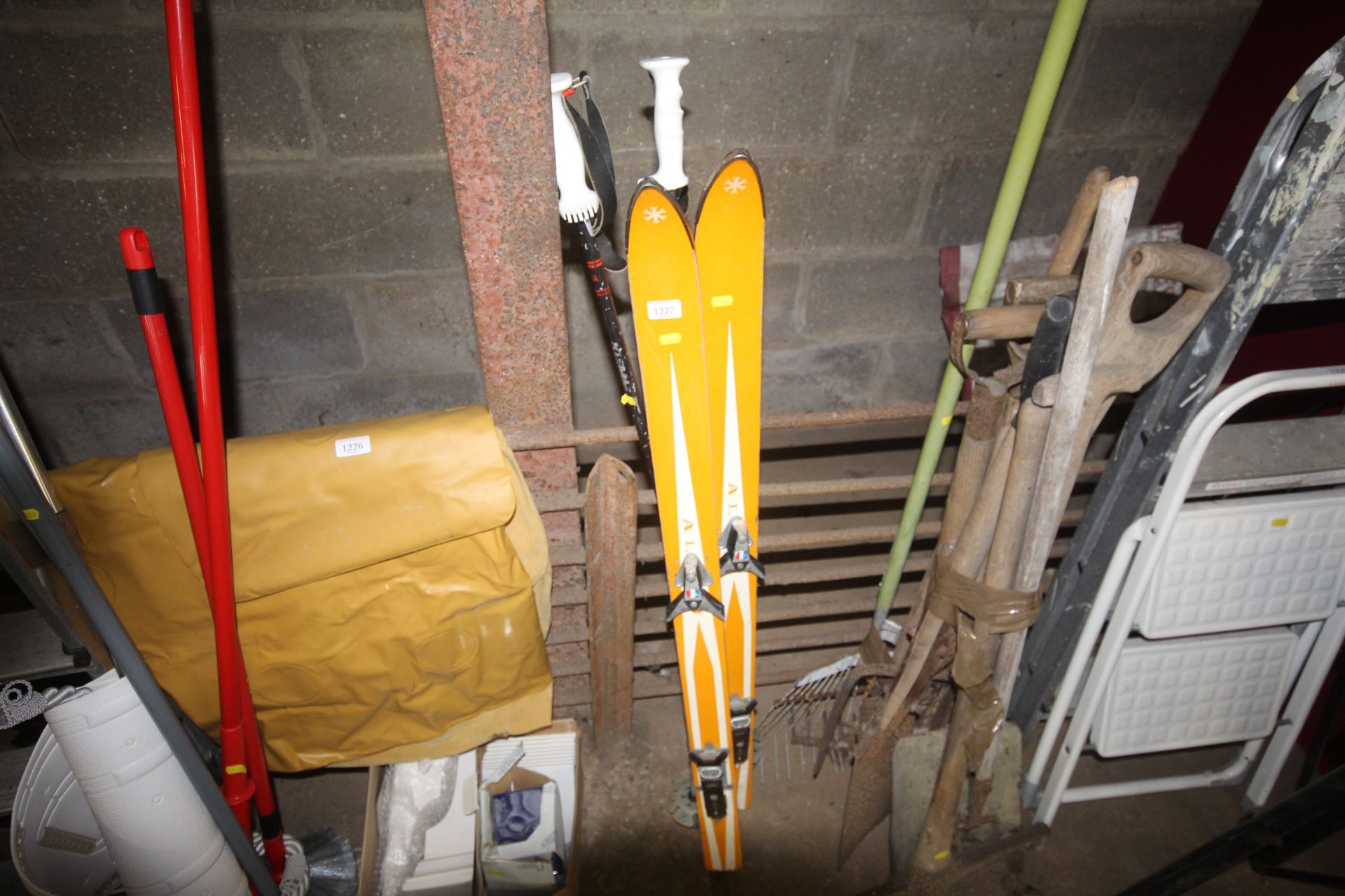 A pair of vintage skis and ski poles