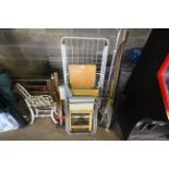 A folding clothes airer, a wooden seated folding s