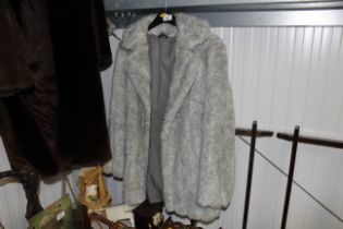 A simulated mink fur coat, size 16