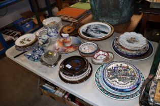 A quantity of various decorative plates etc
