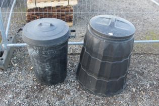 A plastic dust bin and a plastic compost maker