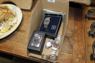 A box of various wrist watches