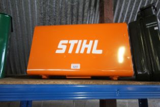 A metal toolbox named to Stihl (212)