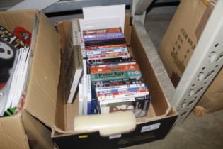 A box of DVDs etc