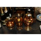 Three brass and copper jugs